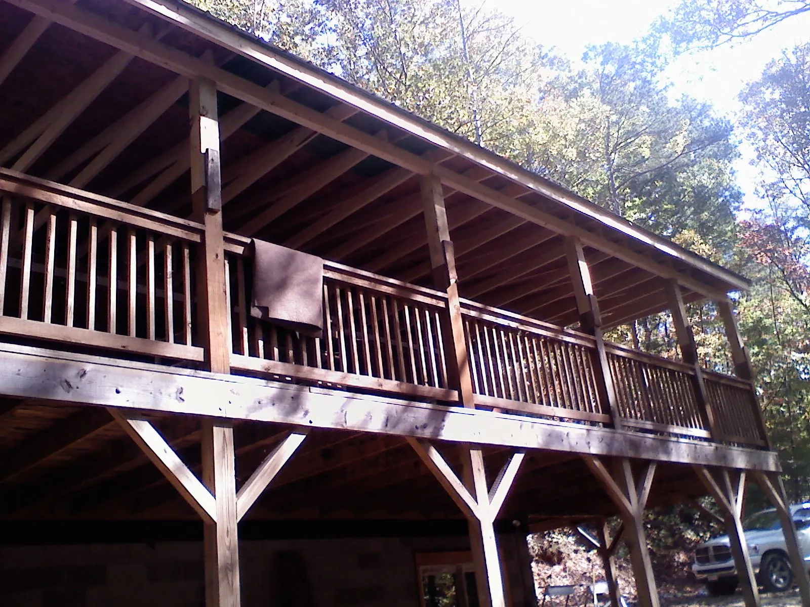 Timber framing under a new elevated porch and deck — Roof Leak Repair in Mattapan by Roofing Brothers